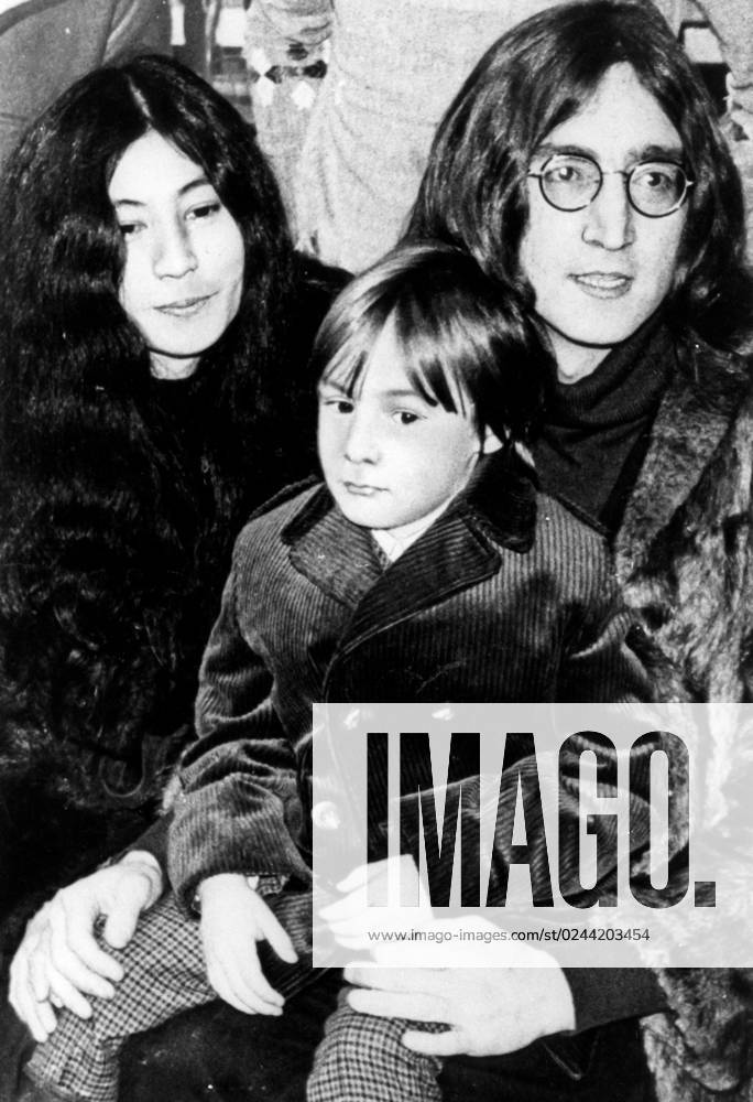 John Lennon With Yoko Ono And The Son Julian. John Lennon With Yoko Ono And The Son Julian.