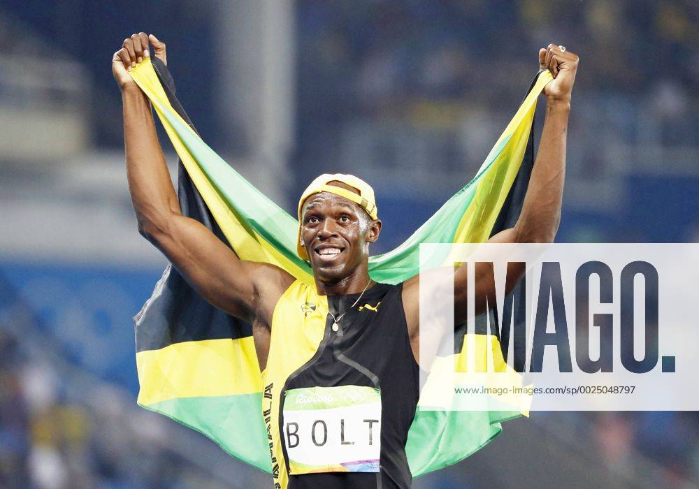 Olympics: Bolt wins 3rd consecutive 100m gold Usain Bolt holds up the Jamaican flag as he celebrates his victory in the men s 100 meters at the Rio de Janeiro Olympics on Aug. 14, 2016. Bolt won with a time of 9.81 seconds, becoming the first man to win the event at three consecutive Olympic Games Olympische Spiele Olympia OS