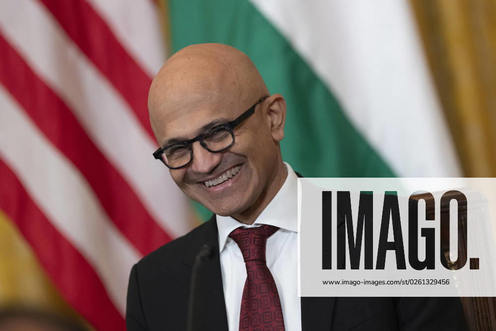 Satya Nadella, CEO of Microsoft, listens during a meeting with President Joe Biden and Prime Minister Narendra Modi of India as senior officials and CEOs of American and Indian companies gather to discuss innovation, investment, and manufacturing at the White House in Washington, DC, on Friday, June 23, 2023. WAX20230623522 ChrisxKleponis