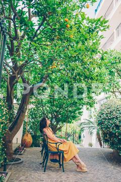 Woman in yellow dress in lemon garden of Sorrento at summer sorrento, lemon, woman, vacation, garden, relax, italian, enjoy, smell, amalfi, farm, italy, agriculture, amalfitana, branch, bright, bunch, citrus, closeup, crop, cultivated, culture, foliage, food, fresh, freshness, fruit, gardening, green, growing, growth, hanging, harvest, healthy, horticulture, juicy, leaf, lemons, mediterranean, nature, orchard, organic, plant, ripe, tranquil, tree, trees, vitamin, yellow