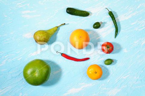 Vegan food. Healthy diet concept. Fruits, vegetables, blue background a flatlay healthy, food, fresh, vegetable, vegan, organic, background, diet, top, view, flat, lay, fruit, table, kitchen, vegetarian, raw, market, natural, delicious, ingredient, feijoa, concept, blue, frame, nutrition, produce, veg, lifestyle, vitamin, cucumber, fiber, grocery, friendly, groceries, supermarket, flatlay, many, tomato, flat lay, ecological, pear, blue background, chili pepper, grapefruit, tangerine, citrus sweet