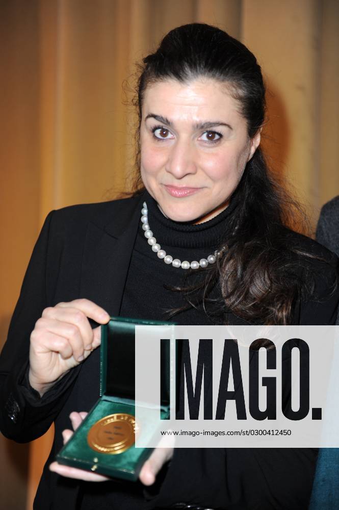 Italian opera singer Cecilia Bartoli receives the Medal of the City of Paris Italian opera singer Cecilia Bartoli receives the Medal of the City of Paris from Anne Hidalgo at City Hall of Paris, in Paris, France, on February 11, 2010. Photo by Morgan Dessalles ABACAPRESS.COM Paris France