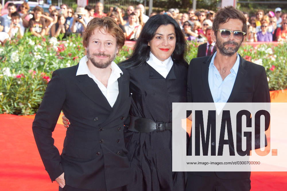 68th Venice Film Festival - Poulet aux Prunes Screening Mathieu Amalric, director Marjane Satrapi and director Vincent Paronnaud arriving on the Red Carpet for the premiere of Poulet aux Prunes held at the Sala Grande Palazzo Del Cinema during the 68th International Venice Film Festival, on September 3, 2011 in Venice, Italy. Photo by Nicolas Genin ABACAPRESS.COM Venice Italy