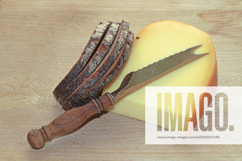 Popular cheese products Middle Ages Gouda in one piece with strong mixed rye bread from the Netherlands