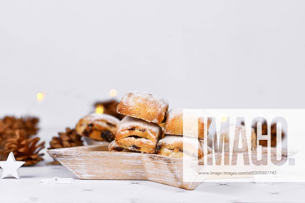 German Studs, a Fruit bread with Nuts, Spices and dried Fruit with Powdered sugar, the traditional to Christmas time served will