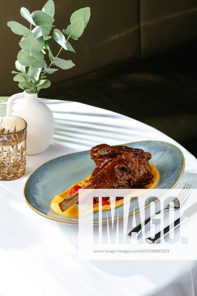 Grilled leg of lamb with vegetables and sauce. restaurant menu R_KUAL231003-1252842-01