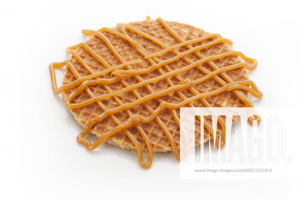 Dutch stroopwafel with caramel topping isolated on white background. , 1682081.jpg, Caramel, Sweets, breakfast, cakes, cookie, delicious, dessert, dutch, food, Holland, isolated, stroopwafel, sweet, waffle, RECORD DATE NOT STATED