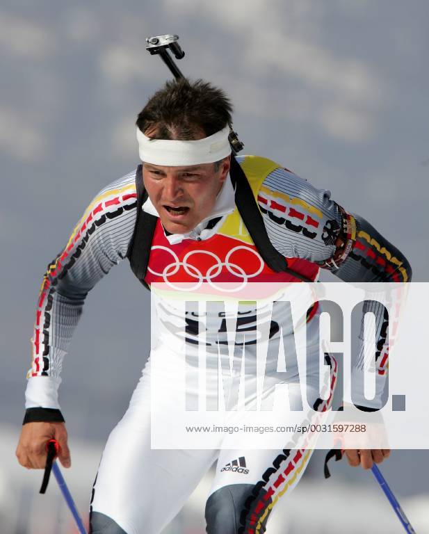 Sven Fischer wins gold in biathlon Sprint 10 km action San Sicario, Italy
