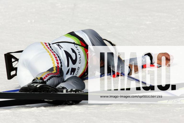 Sven Fischer wins gold in the biathlon in the Sprint he is over 10 km of here exhausted at the finish in San Sicario, Italy