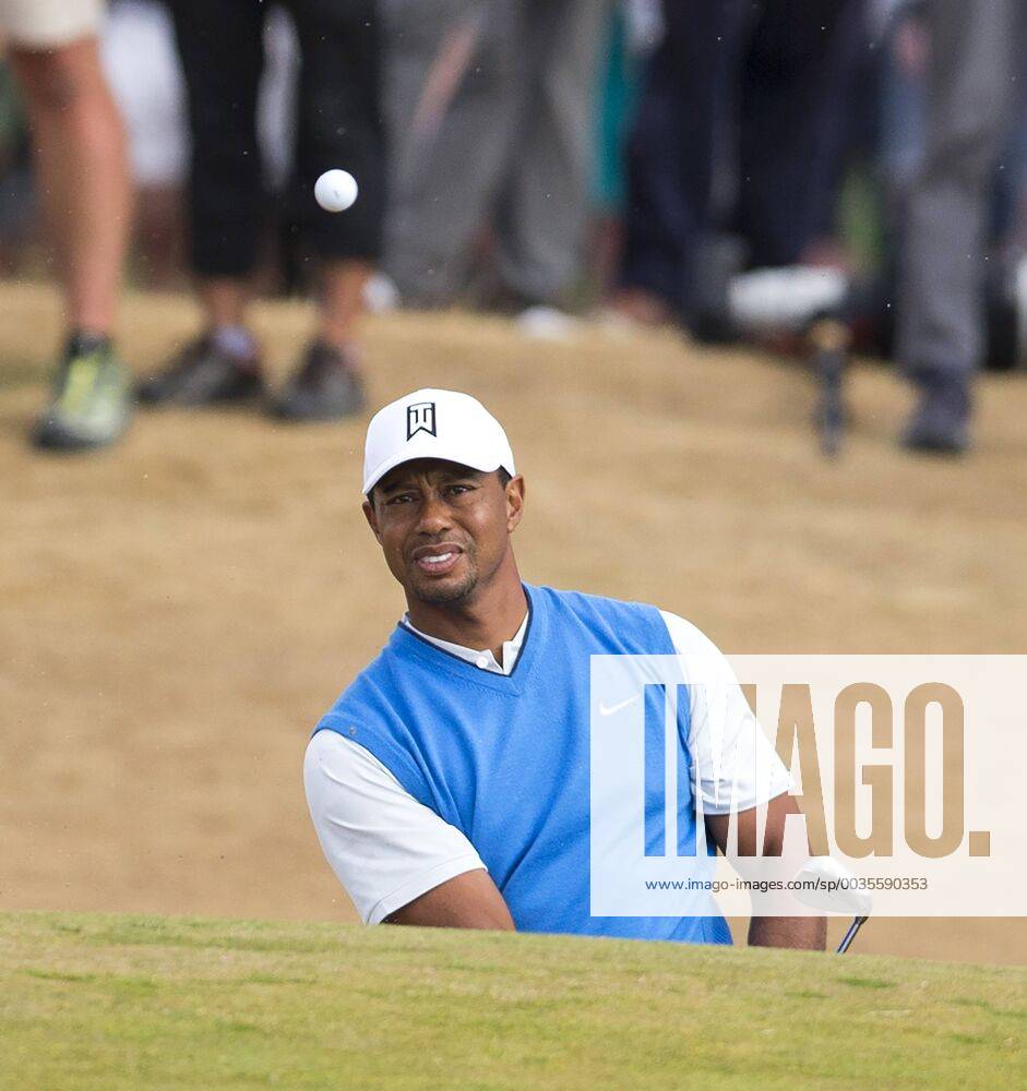 19th July 2018, Carnoustie Golf Links, Angus, Scotland; The 147th Open Golf Championship, 1st round; Tiger Woods (USA) escapes from the sand with his third shot at the par five 6th hole ActionPlus12048689 DavidxBlunsden