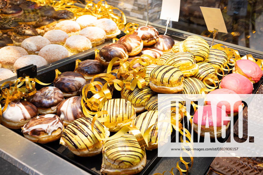 Germany 30 December 2023 In the picture Berliner Pfannkuchen, Berliner, Krapfen is a boiled pastry made of sweet yeast dough with a filling in different variations, they are especially popular on New Years Eve and carnival, carnival eaten district of Osnabrück Lower Saxony