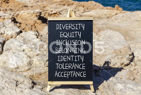 Diversity equity inclusion belonging symbol. Diversity equity inclusion belonging identity tolerance acceptance words written on blackboard on beautiful stone background. Diversity belonging concept. diversity belonging inclusion equity identity tolerance acceptance society blackboard chalk stone beautiful concept text gender religion ethnicity equality word background right equal team social disabled school resource pedagogy leadership discrimination justice orientation message politic support isolated integrate arrangement aid integration business charity community capital innovation inclusive help disability conceptual
