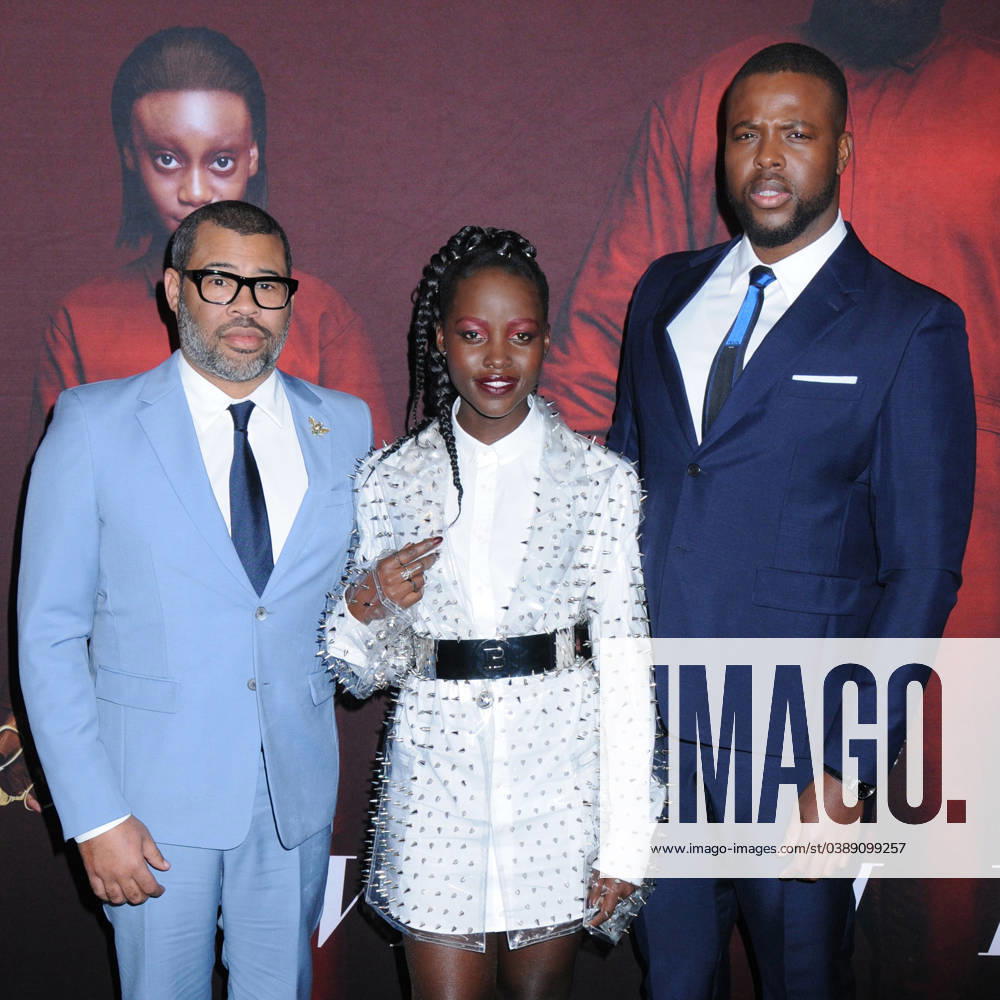 Jordan Peele, Lupita Nyong o and Winston Duke at the Universal Pictures Premiere of US in NYC Jordan Peele, Lupita Nyong o and Winston Duke at the Universal Pictures Premiere of US , at the Museum of Modern Art near Rockefeller Center in New York, New York, USA, 19 March 2019 New York New York USA