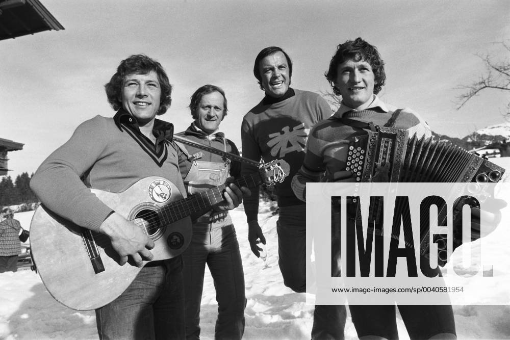 Alpine Skiing World Cup 1974 1975 Kitzbuehel winner KLAMMER Austria Alpine Skiing World Cup 1974 1975 Kitzbuehel downhill 19 01 1975 victory celebration Werner GRISSMANN, coach Charly KAHR, Toni SAILER and winner Franz KLAMMER v left, all Austria make music Kitzbuehel Austria