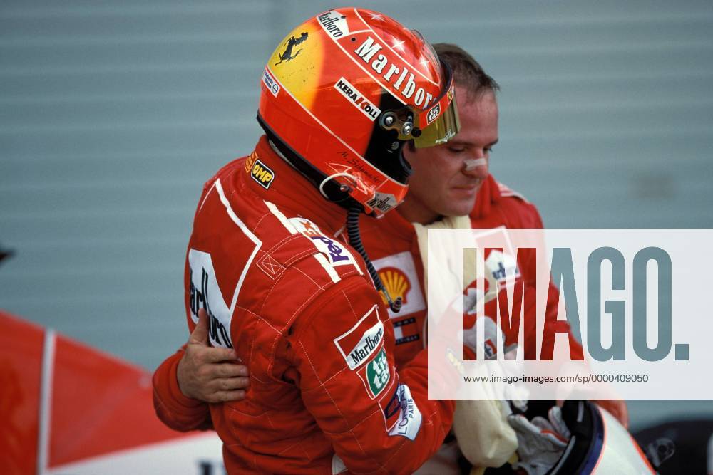 Michael Schumacher (vorn, Deutschland) und Rubens Barrichello (Brasilien beide Ferrari) Motorsport Grand Prix Herren Großer Preis von Japan 2001, Formel 1 Weltmeisterschaft, F1, F, GP, WM, Vdia Gruppe International Racing Course Suzuka Kameradschaft,