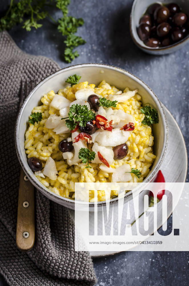 IMAGO Creative, Herbst, Food, Kürbis-Risotto Pumpkin risotto with codfish and chili pepper Pumpkin risotto with codfish and chili pepper
