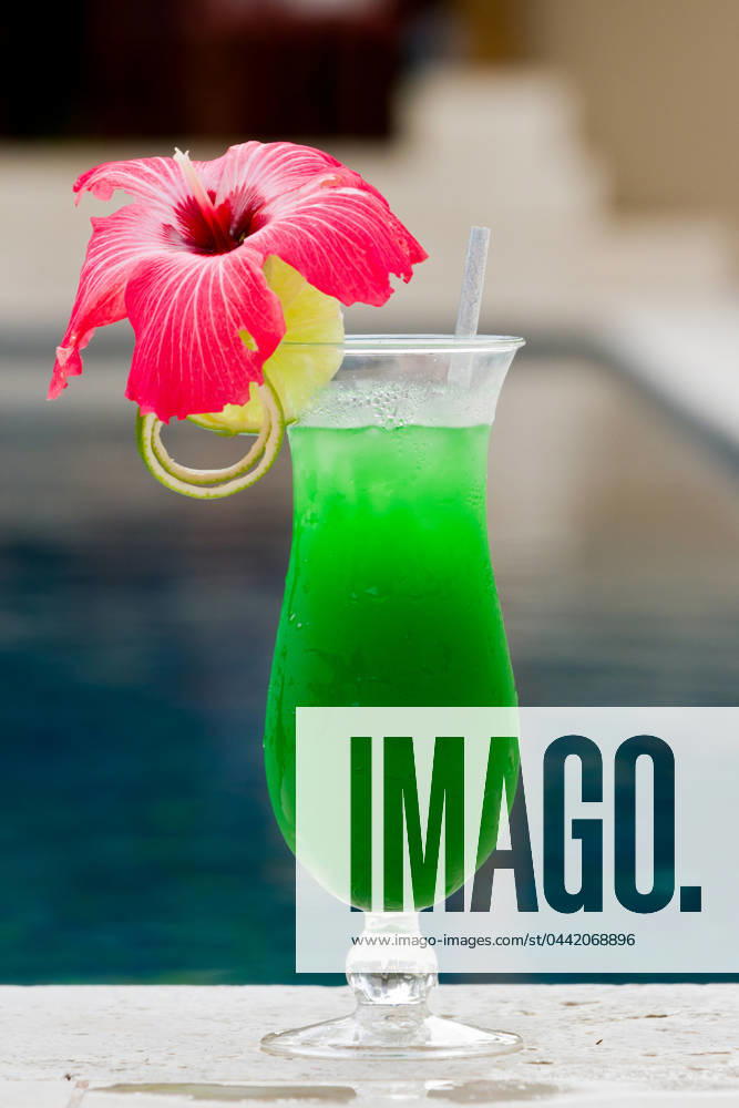 Fresh tropical juice cocktail served pool side in Belize
