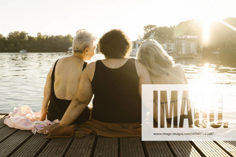 Rear view of elderly senior women enjoying during vacation on houseboat Germany, Berlin, model released, property released