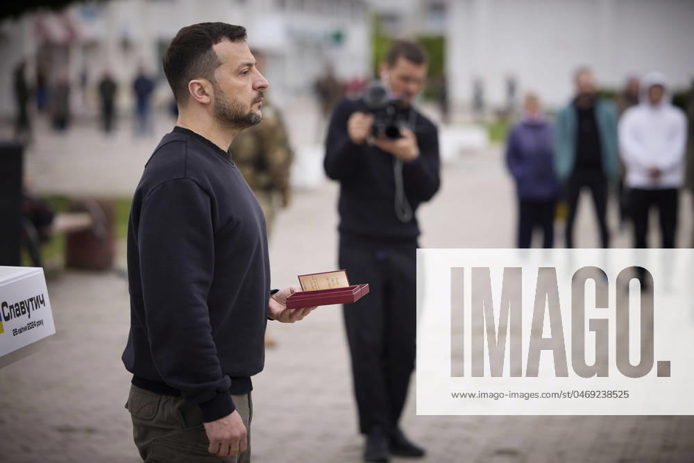 Ukrainian President Volodymyr Zelenskyy, left, presents state awards to survivors and family members of the 1986 Chornobyl nuclear power plant disaster on the 38th anniversary, April 26, 2024, in Slavutych, Ukraine. The Russian invasion of Ukraine has threatened a similar disaster with the Ukrainian Zaporizhzhia nuclear power plant occupied by Russian forces. Slavutych Ukraine - ZUMAp138 20240426_zaa_p138_031