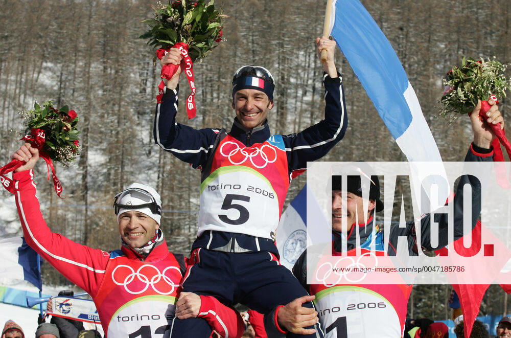 Winter Olympics 2006, Biathlon Gold medalist Vincent Defrasne of France is flanked by silver medalist Ole Einar Bjorndalen of Norway and bronze medalist Sven Fischer of Germany after 12,5 km pursuit at The Winter Olympic Games on February 18, 2006 in Turin, Italy BILDBYRAN,