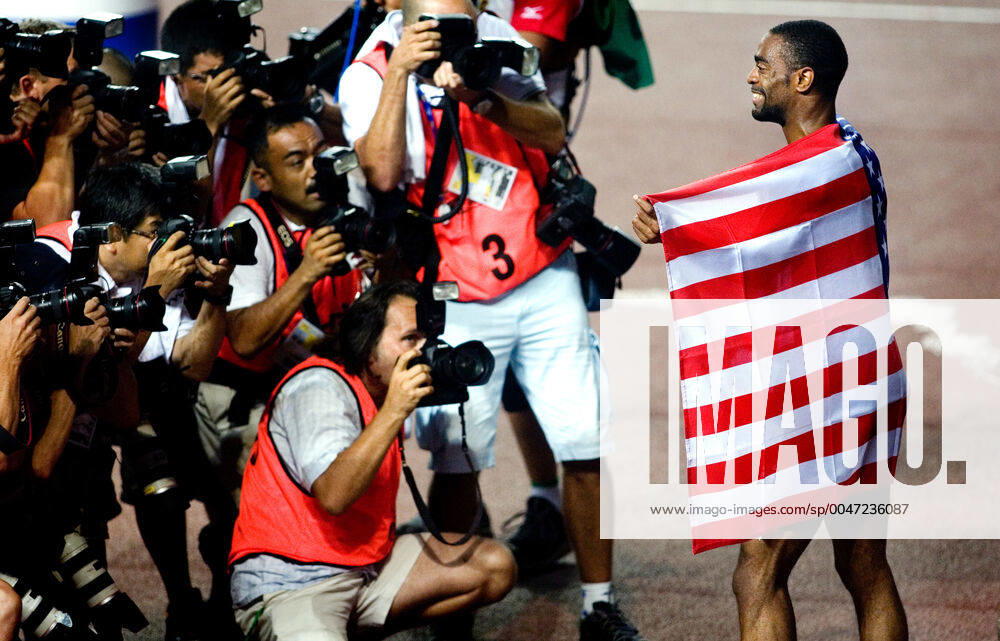 Athletics, World Athletics Championships Gold medalist Tyson Gay of USA celebrate and pose for photographers after 100 m at The World Athletics Championships on August 26, 2007 in Osaka, Japan BILDBYRAN,