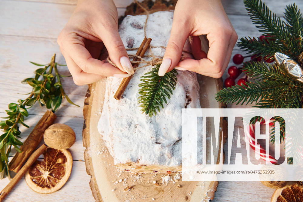 Stollen with holiday decorations. Christmas background Stollen with holiday decorations. Christmas background.