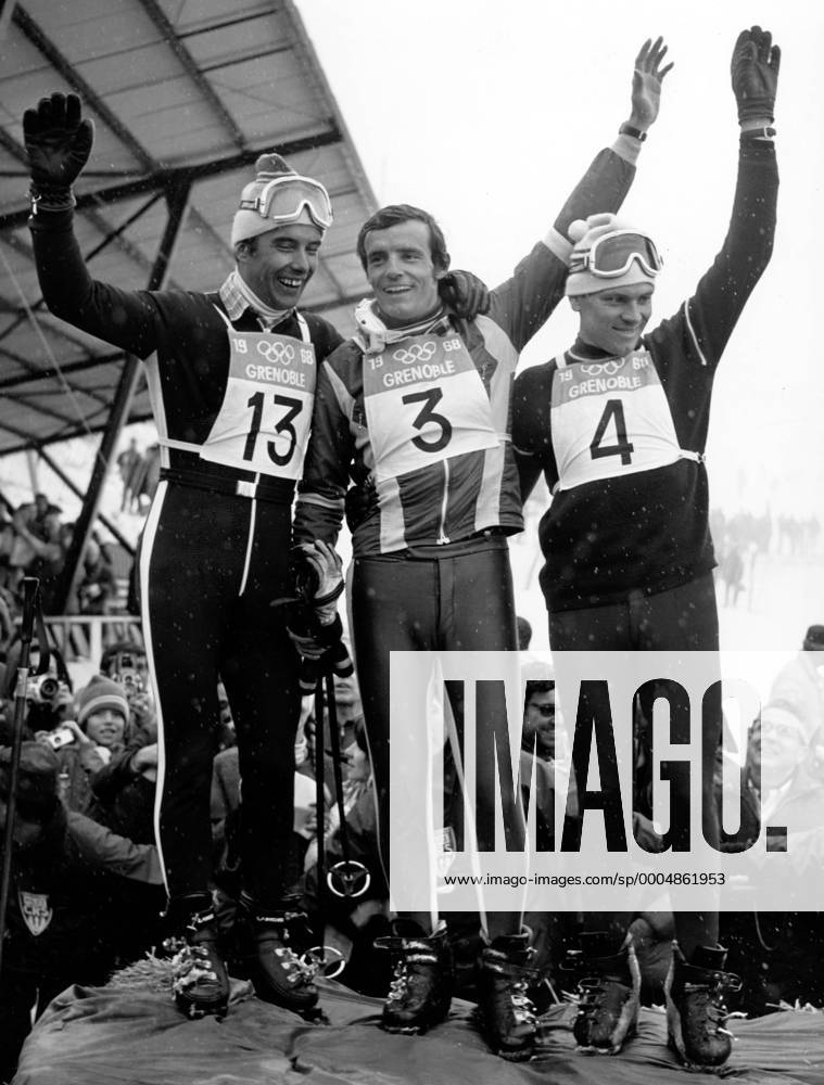 Grenoble - JEAN CLAUDE KILLY (FRA, Mitte) celebrating for his second gold medal. Next to him are Willy FAVRE (SUI; L) and HEINRICH MESSNER (AUT) - ZUMAk09 o0 OS Winter Olympische Winterspiele Olympia o0 Herren Ski Alpin Alpiner Skisport Sieg