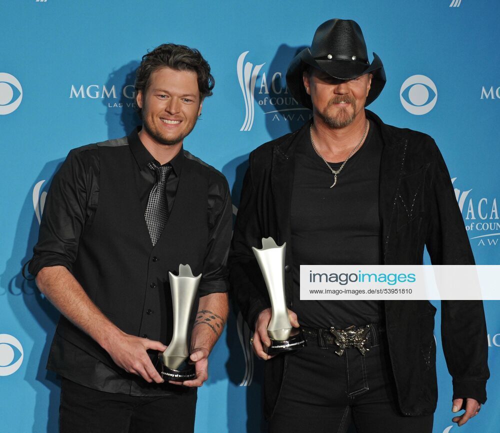 Trace Adkins (R) and Blake Shelton hold their award in the photo room at the Academy of Country Music (ACM) Awards in Las Vegas, Nevada on April 18, 2010. Adkins and Shelton won Vocal Event of the Year. LVS20100418870