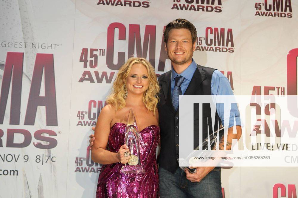 Male Vocalist of the Year Blake Shelton and Female Vocalist of the Year Miranda Lambert pose for photographers back stage at the 45th Annual Country Music Association Awards at the Bridgestone Arena in Nashville, Tennessee on November 9, 2011. CMA20111009837
