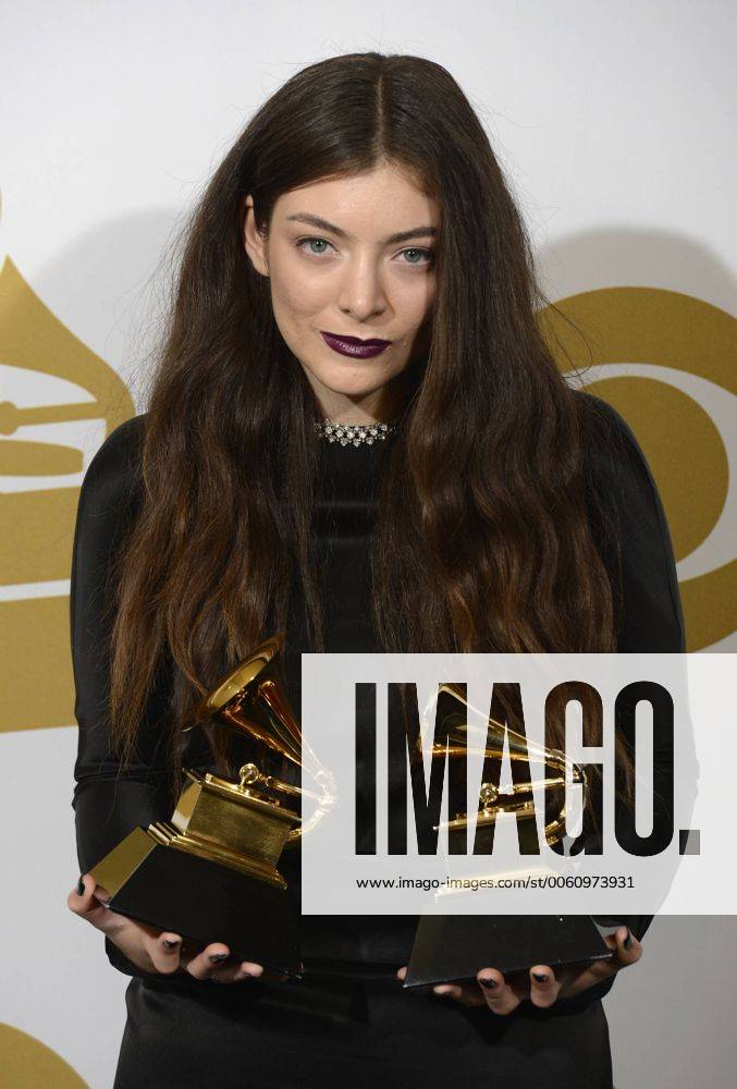 Singer Lorde holds the Grammy Awards she won for best pop solo performance - Royals , backstage at the 56th annual Grammy Awards at Staples Center in Los Angeles on January 26, 2014. LAP20140126834