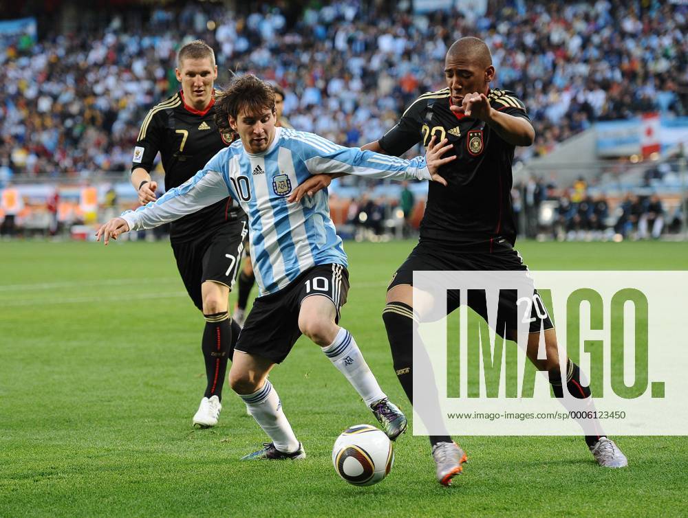 Football - 2010 FIFA World Cup - QuarterFinal - Argentina vs. Germany Lionel Messi of Argentina (L) and Jerome Boateng of Germany in action at Green Point Stadium, Cape Town