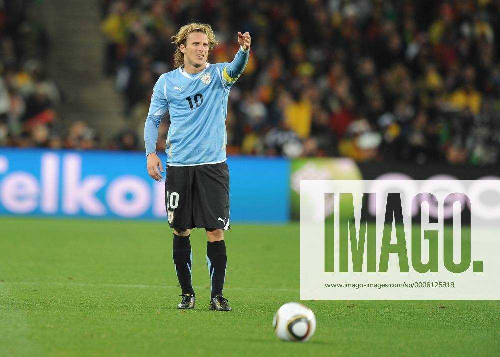 Uruguay forward Diego Forlan (10) prepares to take a free kick during the game between Ghana and Uruguay at Soccer City in the FIFA World Cup 2010. Icon010100702141
