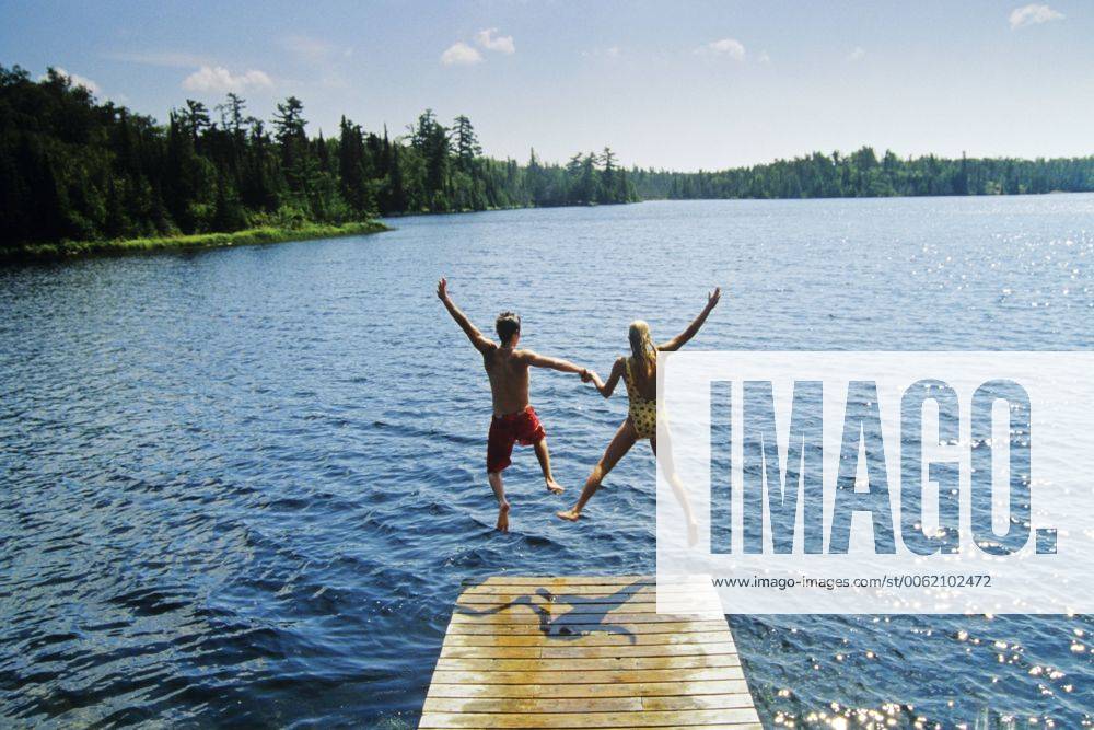 Jumping off dock, Lyons Lake, Whiteshell Provincial Park, Manitoba, Canada. acp12021 DavexReede