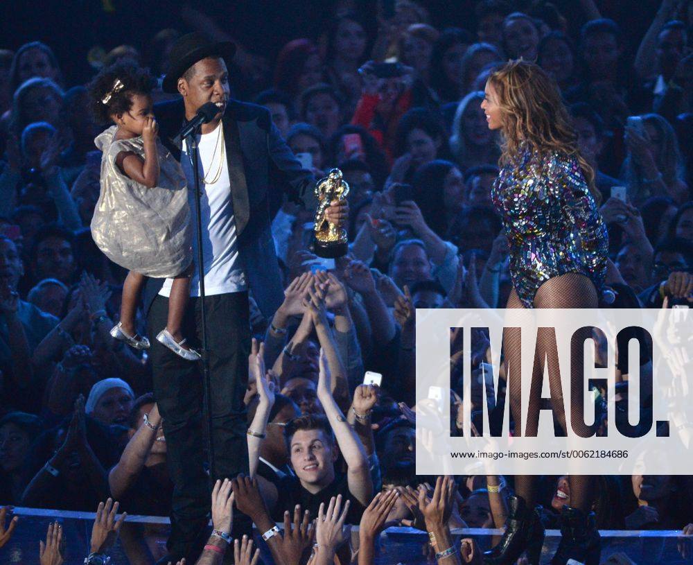 Blue Ivy Carter, Jay-Z and Beyonce accept the Video Vanguard Award at the 2014 MTV Video Music Awards at the Forum in Inglewood, California on August 24, 2014. LAP20140824219