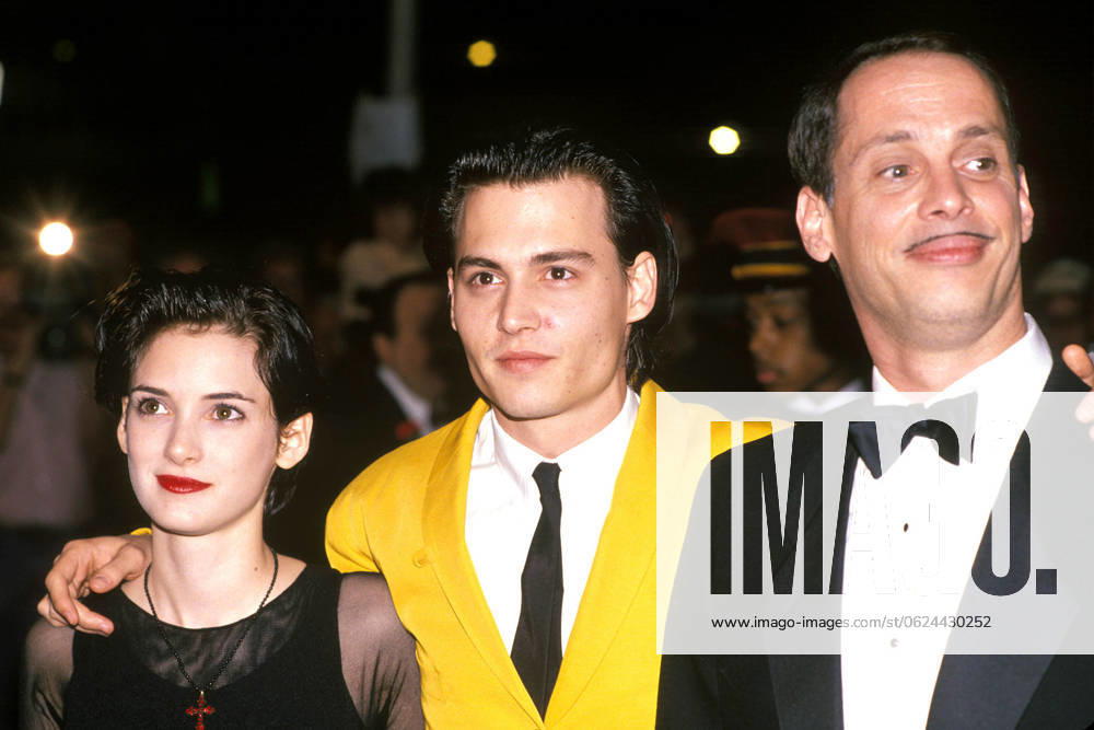 JOHNNY DEPP STOCK IMAGES WINONA RYDER AND JOHNNY DEPP AND JOHN WATERS AT CRY BABY PREMIERE CIRCA 1990 PICTURES ,