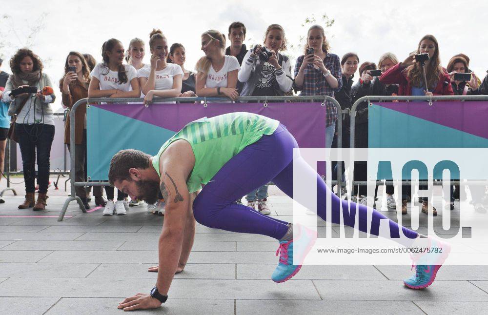 Shia Labeouf runs a marathon around the Stedelijk Museum as part of the performance Metamarathon. It involves 144 rounds around the museum