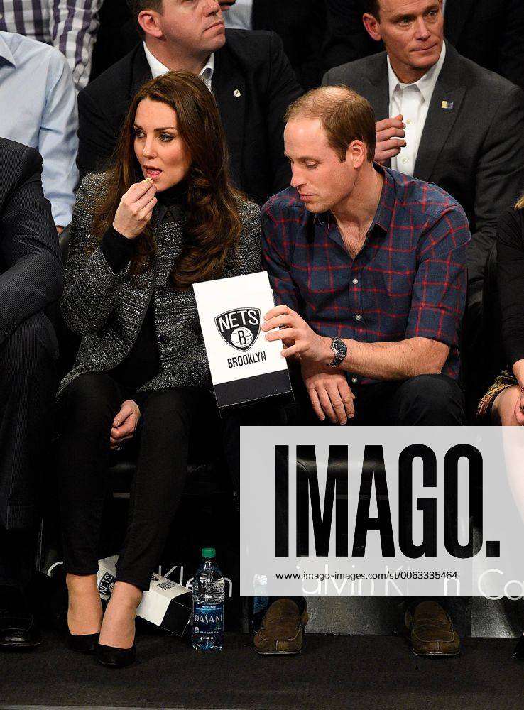 Prince William and Kate, the Duke and Duchess of Cambridge watch the Brooklyn Nets play the Cleveland Cavaliers at Barclays Center in New York City on December 8, 2014. NYP20141209130