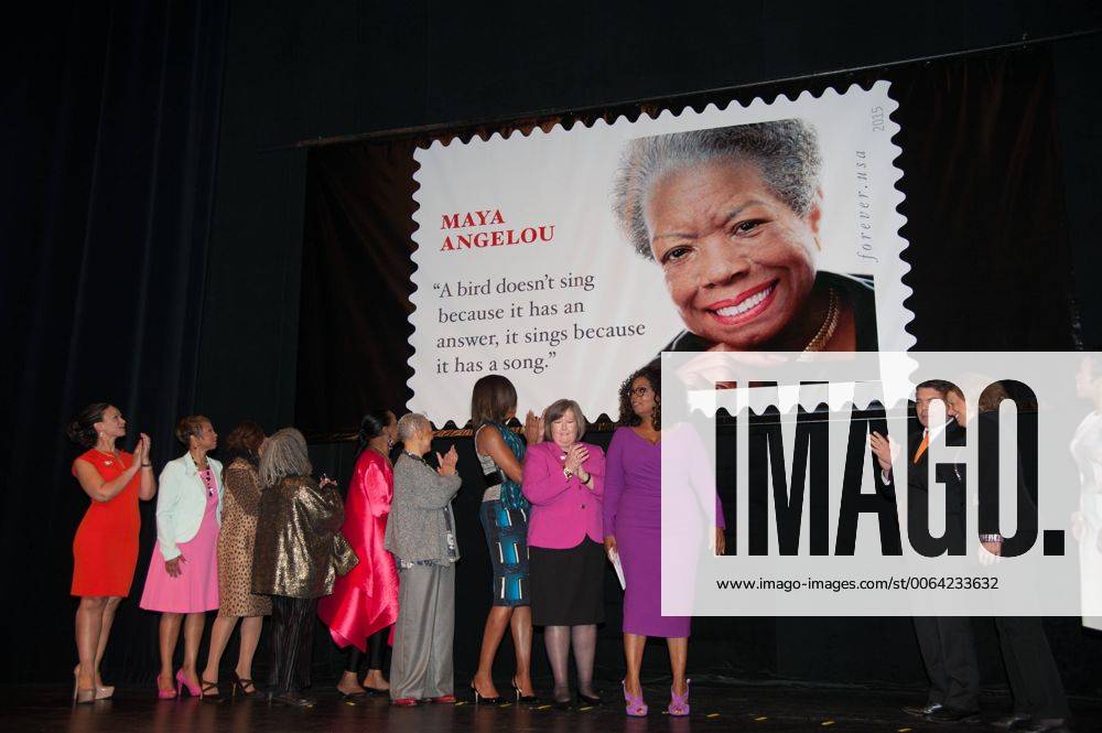 Washington, District Of Columbia, U.S - First Lady Of The United States MICHELLE OBAMA, Postmaster general, MEGAN BRENNAN, and CEO of OWN, OPRAH WINFREY, along with other special guests at the dedication of the Maya Angelou Forever Stamp The dedication was held in front of a capacity crowd at Washington s D.C. Warner Theater Washington U.S. - ZUMArf1_