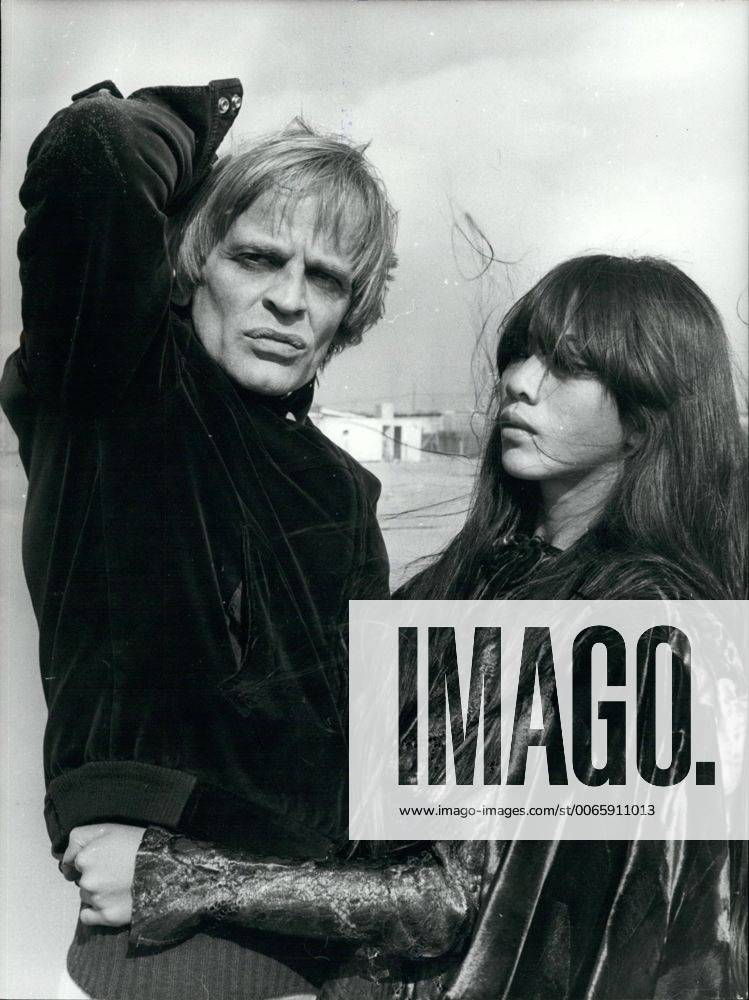 Dec. 20, 1978 - Third Marriage, for the German Actor Klaus Kinski. The Bride is the young Vietnamese Min Hoi, 21, from Saigon. She is daughter of a Vietnamese woman and a French. She has never done of the cinema. Blonde Kalus, who is the good protagonist of many Italian western and is well known, after his marriage will play the role of the famous American Writer Edgard Allan Poe. OPS: The two fiancées seen at the Fregen Beach. - ZUMAk09_