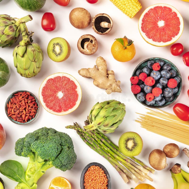 Vegan food. Healthy diet concept. Fruits, vegetables, pasta, nuts, legumes, mushrooms, Vegan food. Healthy diet concept. Fruits, vegetables, pasta, nuts, legumes, mushrooms, overhead square shot on a white background. A flatlay composition