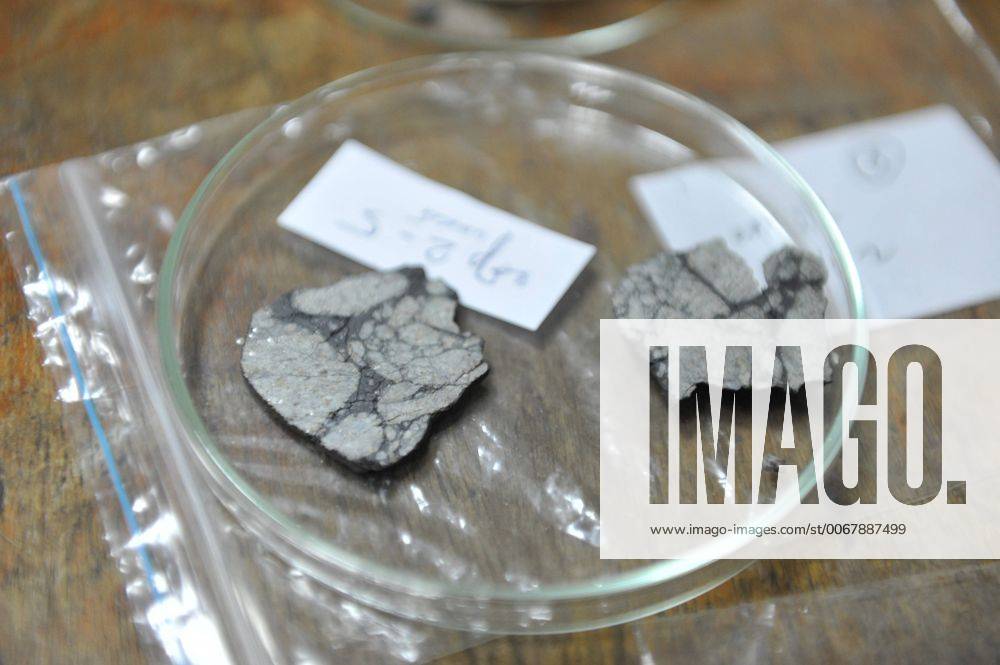 Feb. 26, 2013 - Moscow, Russia - February 26,2013.Moscow,Russia. Chebarkul meteorite is the proposed name for the fragments of the asteroid that entered the atmosphere of Earth and caused the Russian meteor event on February 15, 2013. ..Pictured: Vernatsky Institut of Geochemistry, Moscow. Chebarkul meteorite fragments found at Chebarkul lake. - ZUMAeor