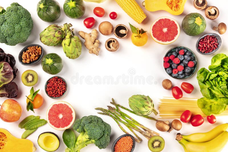 Vegan food. Healthy diet concept. Fruits, vegetables, pasta, nuts, legumes etc, Vegan food. Healthy diet concept. Fruits, vegetables, pasta, nuts, legumes, mushrooms, shot from the top on a white background, forming a frame with a place for text. A flat lay composition