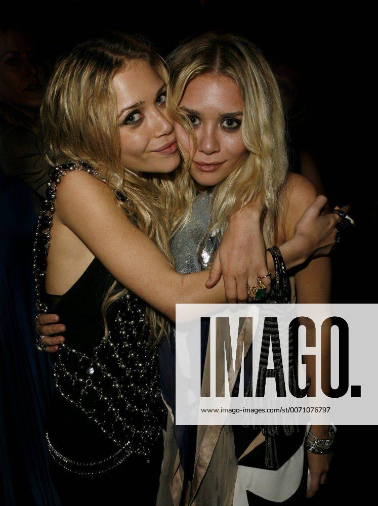 Feb 07, 2011 - Los Angeles, California, U.S. - ASHLEY OLSEN and MARY KATE OLSEN (Olsen Twins) pose at a party in Los Angeles. - ZUMAl55_