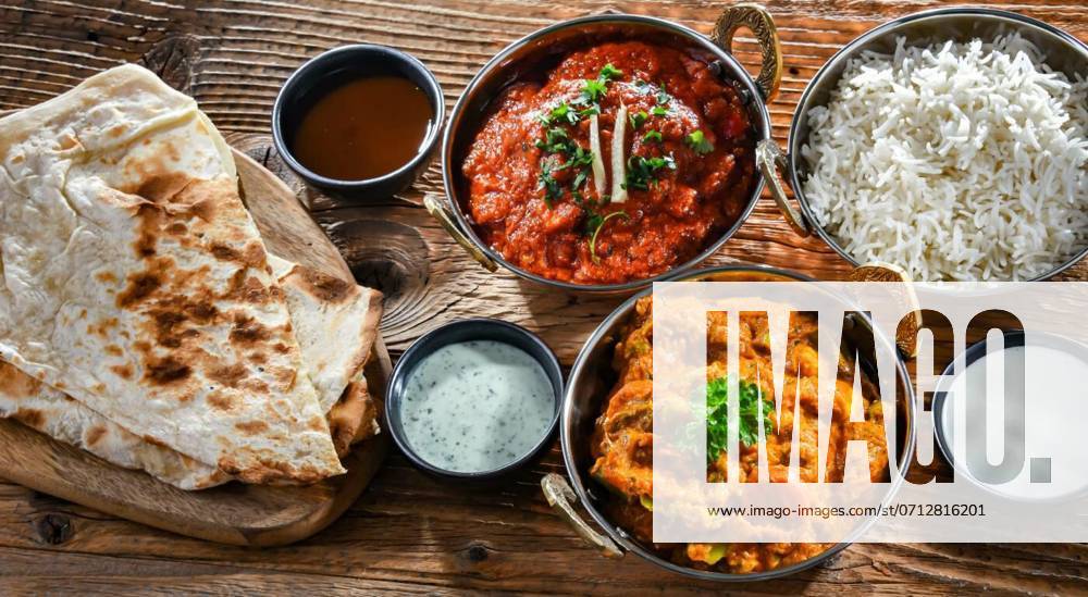 IMAGO Creative, Food, Brot, Naan Hot madras paneer and vegetable masala with rice, Hot madras paneer and vegetable masala with basmati rice served in original indian karahi pots., Hot madras paneer and vegetable masala with basmati rice served in original indian karahi pots., 02.07.2023,