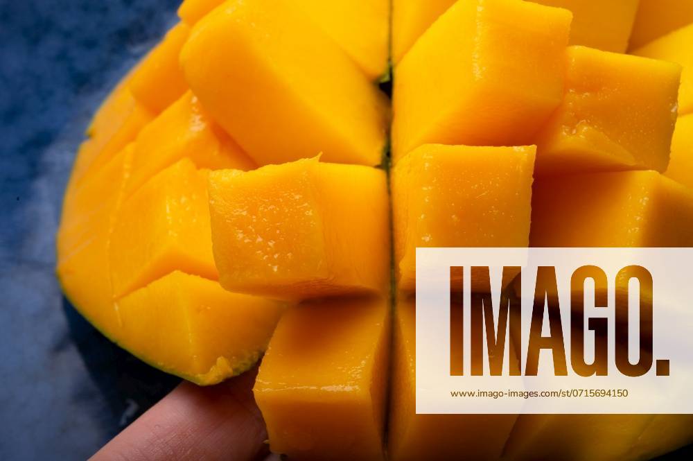 Ripe and tasty egyption Mango cubes. macro shot ,model released, Symbolfoto