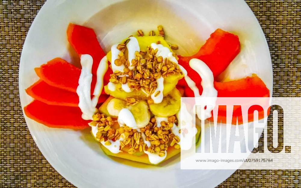 Fruit on plate for breakfast melon apple papaya pineapple mango, Fruit in a plate for breakfast watermelon pineapple papaya melon mango banana in Playa del Carmen Quintana Roo Mexico., Fruit in a plate for breakfast watermelon pineapple papaya melon mango banana in Playa del Carmen Quintana Roo Mexico., 28.07.2024,