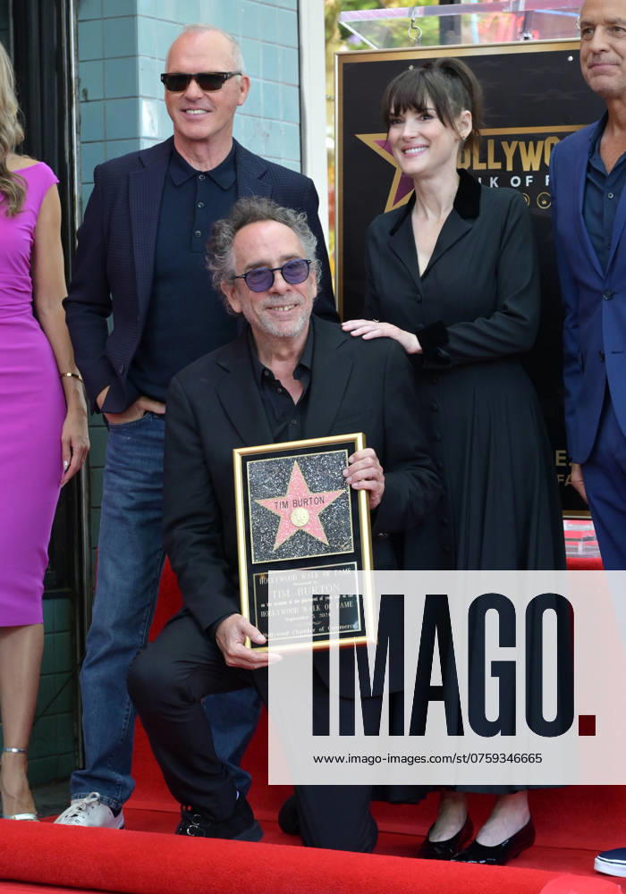 Tim Burton Star Ceremony - September 03, 2024 LOS ANGELES, CA. September 03, 2024: Michael Keaton, Winona Ryder & Tim Burton on Hollywood Boulevard where Tim Burton was honored with a star on the Hollywood Walk of Fame. Los Angeles CA USA