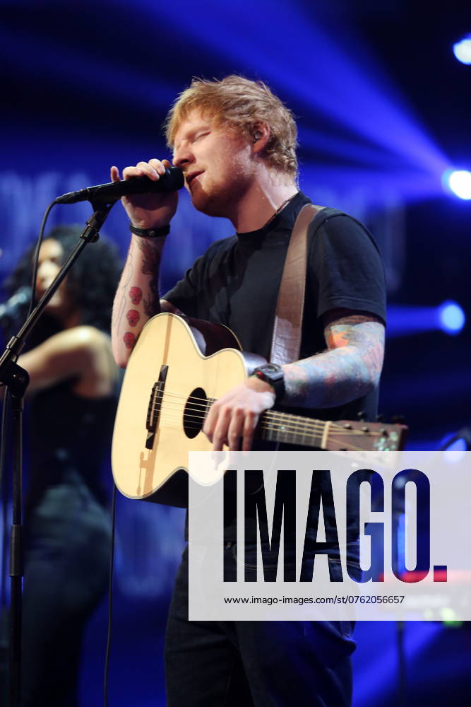 Ed Sheeran Live in Copenhagen. Photo. Ed Sheeran Edward Christopher Ed Sheeran (born 17 February 1991) is an English singer-songwriter and guitarist. He also writes and produces songs on his own and created his label, Paw Print Records. 2 Sheeran is recognized for doing pop music. He was born in Halifax, West Yorkshire. As a child, he lived in Framlingham, Suffolk. Sheeran is set to release his third studio album, ˜ ( divide ), on 3 March 2017. He released the two singles Shape of You and Castle on the Hill in January 2017. Shape of You became his first number-one hit on the Billboard Hot 100 when it entered at the top of the chart. The song has reached number one in several countries around the world, and Castle on the Hill