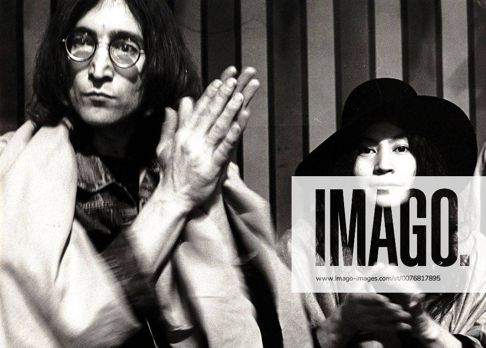 Dec 08, 2005; London, England, UK; Today marks the 25th anniversary of the death of JOHN WINSTON LENNON. He was born on Oct. 9th, 1940 in Liverpool and was best known as a singer, songwriter, poet and guitarist for The Beatles. He is recognized as one of the greatest musical icons of the 20th century. On the evening of Dec. 8th, 1980, in New York City, deranged fan Mark David Chapman shot Lennon 4 times in the back and shoulder. Despite extensive resuscitative efforts, Lennon died of shock and blood loss at the age of 40. PICTURED: (File Photo: Date Unknown) JOHN LENNON (1940-1980) and YOKO ONO at The Rolling Stones Rock And Roll Circus. Mandatory - ZUMAz05_ 20051208_sim_z05_458