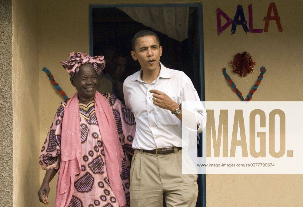 Aug. 26, 2006 - U.S. - U.S. Sen. Barack Obama (D-IL) emerges with his grandmother, Sarah Hussein Obama, from her house in his family s village of Kogelo, Kenya on August 26, 2006. ( Chicago Tribune MCT) - ZUMAm67_ 20060826_baf_m67_058